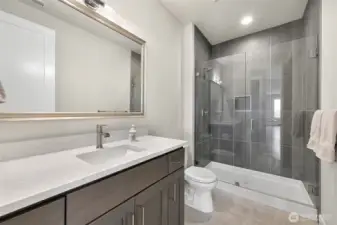 Entry 3/4 bath across from bedroom 2 as you enter the living area perfect for guests.