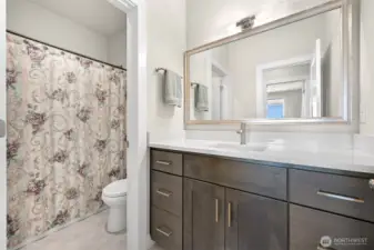 Downstairs Bathroom directly across from bedroom 3.