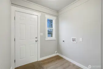 Seamless indoor-outdoor flow w/ back door leading out...