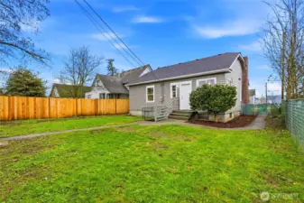 Private, generous backyard w/ new fencing.