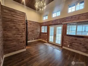 Interior of additional structure. Could be an office, hobby room, or game room.