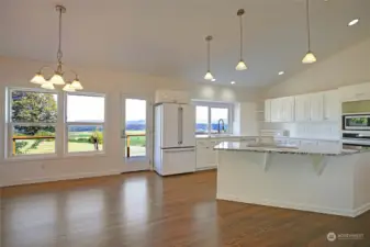 Views abound!  Newer appliances and flooring.