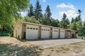 The Shop/Garage dreams are made of! 38x71 (2,698sqft) 4-Bay detached garage/shop with full 10x25 insulated storage room and a 38X25 finished and insulated hobby room with sliding glass doors to its own patio.  220 outlets, air compressor and a 440 outlet in the garage. Pellet stove is installed in the insulated hobby room and the room is plumbed for a potential bathroom.