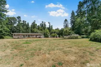 Spacious grounds with a chicken coop and 12.88 acres to play!