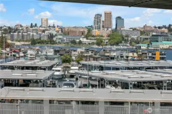 Take in the unique blend of scenery—marina life, boathouses, city, and serene lake views—all from your home.