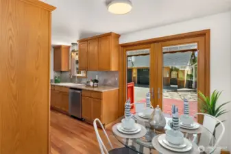 Beautiful Andersen doors open up to large deck.