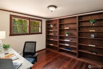 Built-in bookcase found in second bedroom on main floor. Could also be an office.