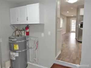 The Kitchen leads into the Laundry Room.