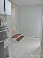 Laundry Room w/ tile floors.