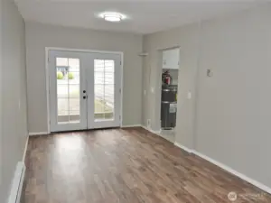 Large Bonus Room w/ French-style doors leading from the driveway in front.