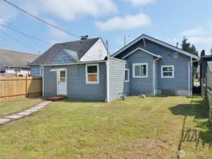 Rear view of the Home and Backyard.