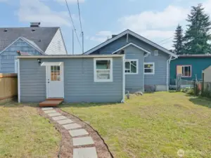 Rear view of the Home and Backyard.