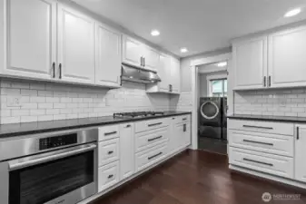 Updated kitchen-modern finishes, gas stove, and great flow for entertaining.