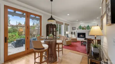 Upgraded patio-doors complete with triple lock, solid construction, beautiful fir finish - and an incredible passage into the back yard oaisis.