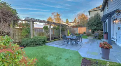 Lush backyard with a patio