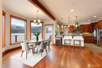 Serving meals is simplified thanks with the easy flow from kitchen to dining area.