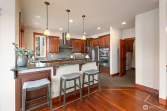 Counter seating adds a casual dining option for Sunday morning pancakes.