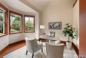 The front room flexes as an office or 4th bedroom.