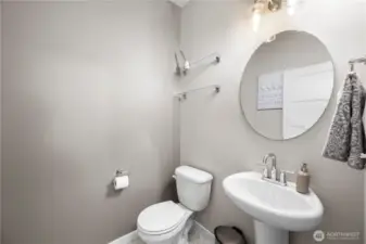 Main floor powder room thoughtfully placed for everyday convenience.