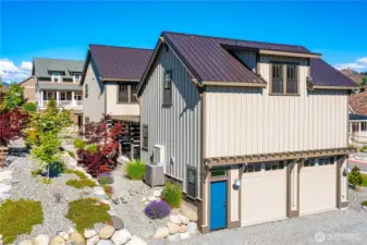 Exterior view of home with attached 2-car garage.