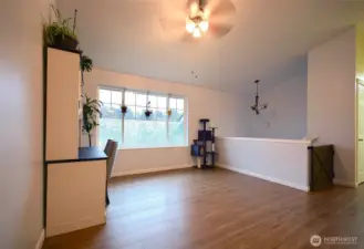 A second view of the living room, emphasizing its spacious and functional design.