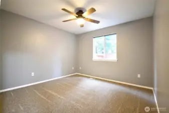 Updated bedroom with modern flooring and connectivity ideal for work or study