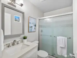 The primary suite also includes this 3/4 bath with double sized shower.