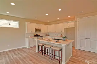 Photos are of similar home built by this Builder and are for illustration purposes only to reflect layout and typical finishes. May depict seller enhancements. Colors and options may vary.