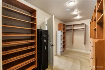 Walk-in closet with built-in shelving.