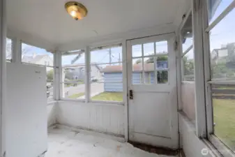Mud room in rear entry freezer conveys