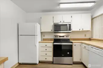 New stainless steel microwave and 4--burner cooktop/oven in 2023