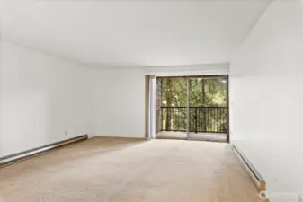 Open concept living space- new carpet in 2023