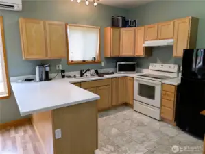 ADU - Generous kitchen with Corian countertops