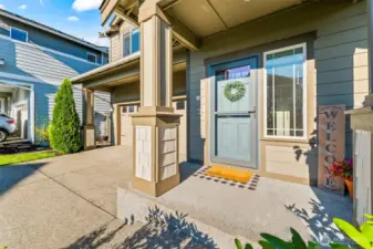 Inviting front entryway with covered porch, perfect for welcoming guests into this Black Diamond real estate gem.