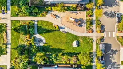 Aerial view of the local park, surrounding homes, and community amenities in Black Diamond.