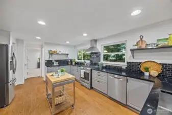 Dreams do come true!!! Stunning quartz counters offer space to spread out and create the most magnificent culinary delights!
