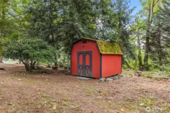 As you explore further, this cute little barn will happily provide a home for all your garden tools and toys!