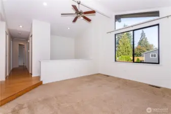 Spacious living room at top of front door.