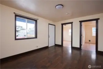 Lower Unit. Entries to Bedrooms looking West.