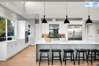 Complete Chef's kitchen with Bellmont cabinets, quartz countertops, GE Cafe Appliances; 48" Fridge, 6 Burner Gas range, 30" Combination double wall oven with true convection and a 5-in-1 oven with Advantium Technology, side prep sink, etc.