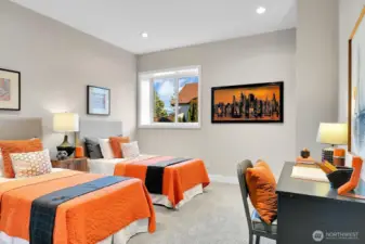 Lower bedroom with East side lake view and custom closet.