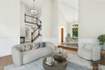 The living room and dining room flows together for easy entertaining or everyday use. Put a TV in this room and make another beautiful media space.