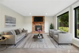 This fun family room will be a place to create memories and relax by the gas fireplace.