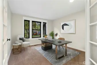 Here a main floor office or bedroom with a closet and French doors.