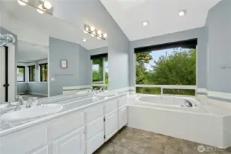 Soak in the jetted tub and look outside at nature and tree tops.