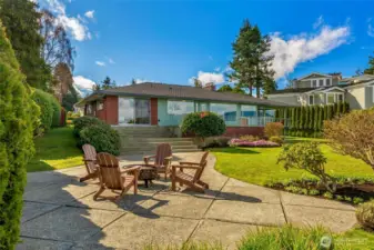 Whether gathered around the kitchen, out on the lawn, or watching boats pass by the windows, this is a property that naturally draws people in.
