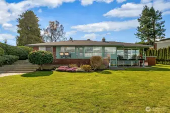 The large, level lawn offers room for games, tents, celebrations, and all kinds of outdoor gatherings.