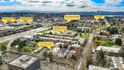 Ariel view facing south with the Northgate Mall, the Kraken Iceplex, and the Northgate Light Rail 1&2 to the left. The John Lewis Memorial Bridge is a walking bridge that crosses I5 to get to the Light Rail and other conveniences. Immediate on-ramp to I5 1 block away on the left. North Seattle College top right corner of the picture