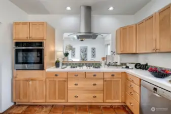 Huge kitchen with tons of counter and cabinet space opens to the dining room