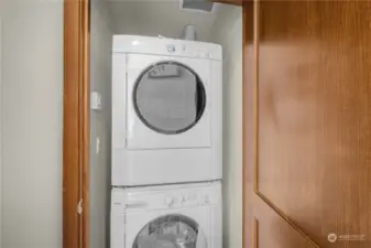 Full-sized washer and dryer on the upper level, between the two bedrooms.